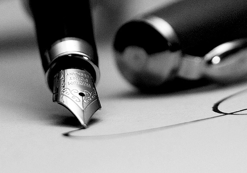 pluma papel
